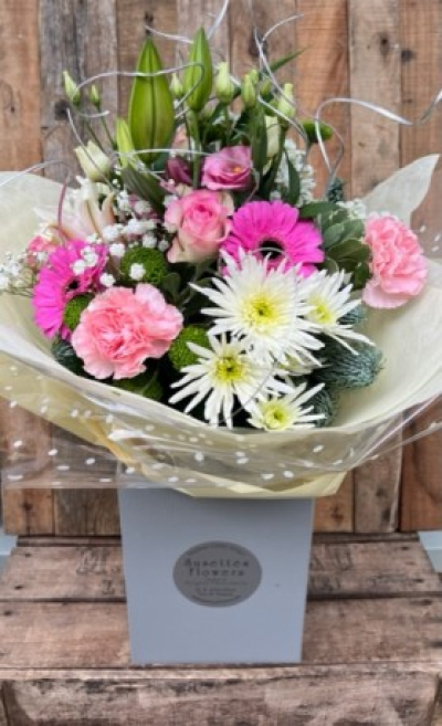 Pretty in Pink Handtie - A stunning mix of pink and white flowers hand delivered by the florist would be perfect for any occasion