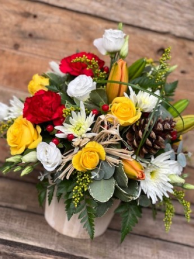 Woodland sunrise arrangement - Adding a touch of autumn to the home this beautiful floral arrangement combines warm colours and seasonal flowers in a modern design, with a stunning selection of roses, lilies, lisianthus and chrysants with solidaster and hypericum berries presented and arranged in a stylish container. 

 

A beautiful scented arrangement hand delivered by you local florist in Bury St Edmunds, a perfect floral gift for any occasion.

Please note that due to the seasonal availability of flowers it may be necessary to vary individual stems from those shown. Our skilled florists may substitute flowers for one similar in style, quality and value. Where our designs include a sundry item like a vase or basket it may not always be possible to include the exact item as displayed. If such an occasion arises we will make every effort to replace the item with a suitable alternative.