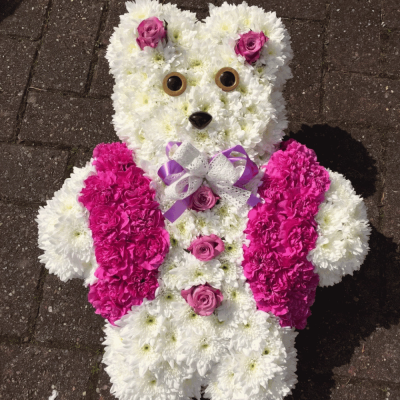 Teddy Bear - A white Chrysanthemum Teddy Bear. With waistcoat, button and bow detail, can also be created in pink or blue, please call us on 01284 753777 for details.